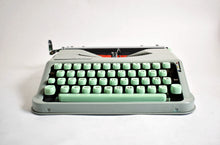 Afbeelding in Gallery-weergave laden, Hermes Baby Typemachine uit 1962 - qwertz