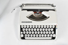 Load image into Gallery viewer, 1973 Hermes Baby Typewriter - French and English keyboard AZERTY
