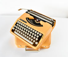 Load image into Gallery viewer, Olivetti Lettera 82 Orange Portable Typewriter
