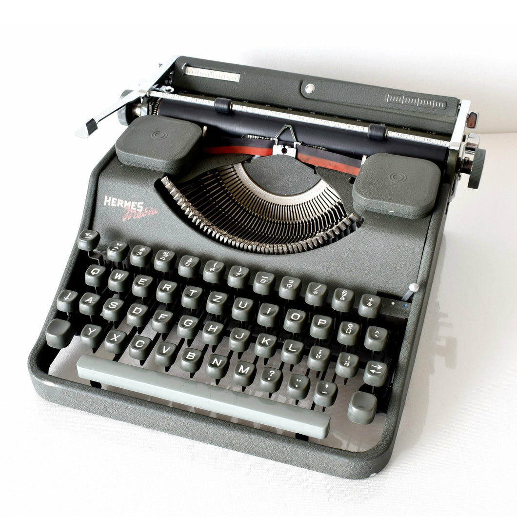 1954 Hermes 2000 Typewriter Elite typeface