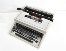 Load image into Gallery viewer, Olivetti Dora, UNCOMMON Techno cubic typeface
