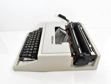 Load image into Gallery viewer, Olivetti Dora, UNCOMMON Techno cubic typeface
