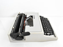 Load image into Gallery viewer, Olivetti Dora, UNCOMMON Techno cubic typeface
