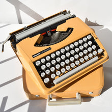 Load image into Gallery viewer, Olivetti Lettera 82 Orange Portable Typewriter
